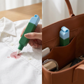 COLOUR:Green - degreasing pen being applied to a stain on a white shirt
