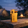 Compact torch on a weathered wooden bench at dusk