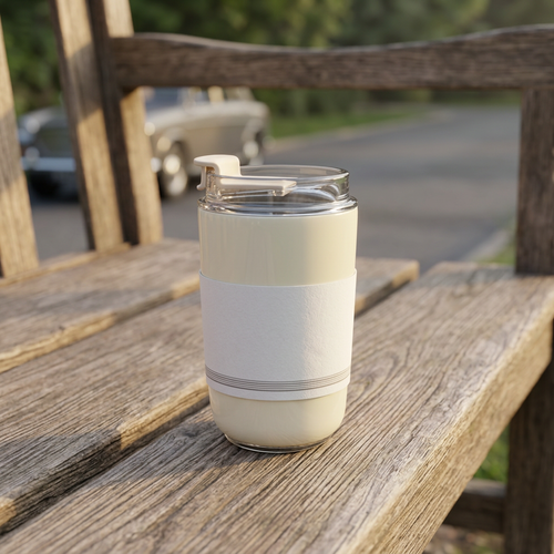 Small insulated travel cup on a wooden bench